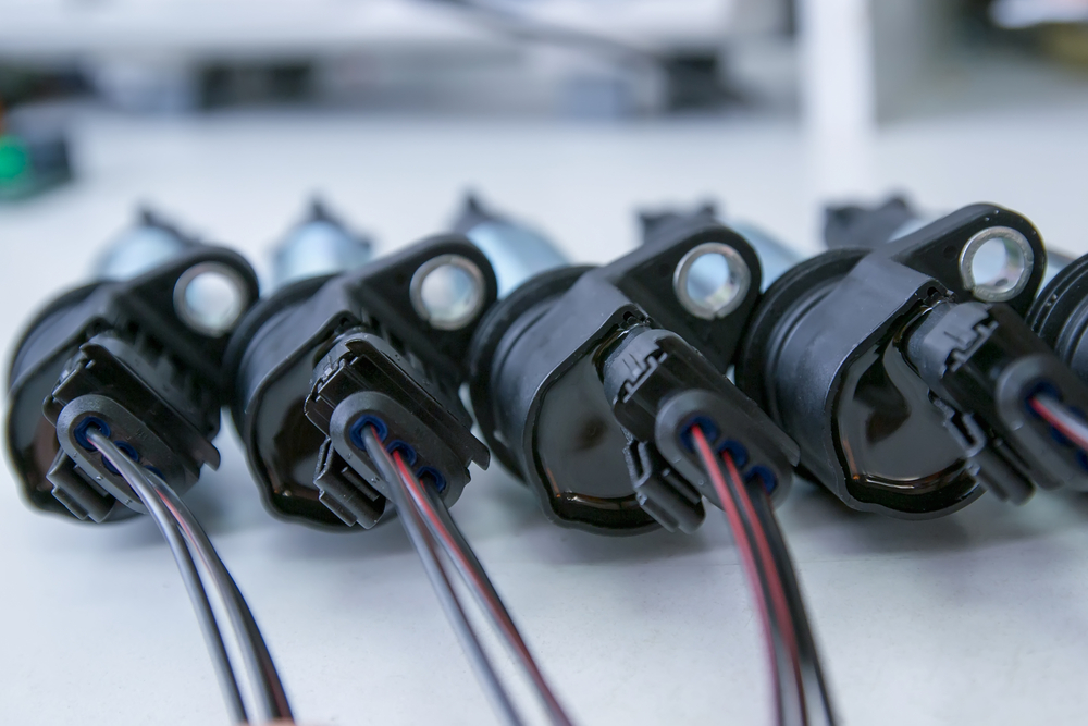 A set of ignition coils on a counter